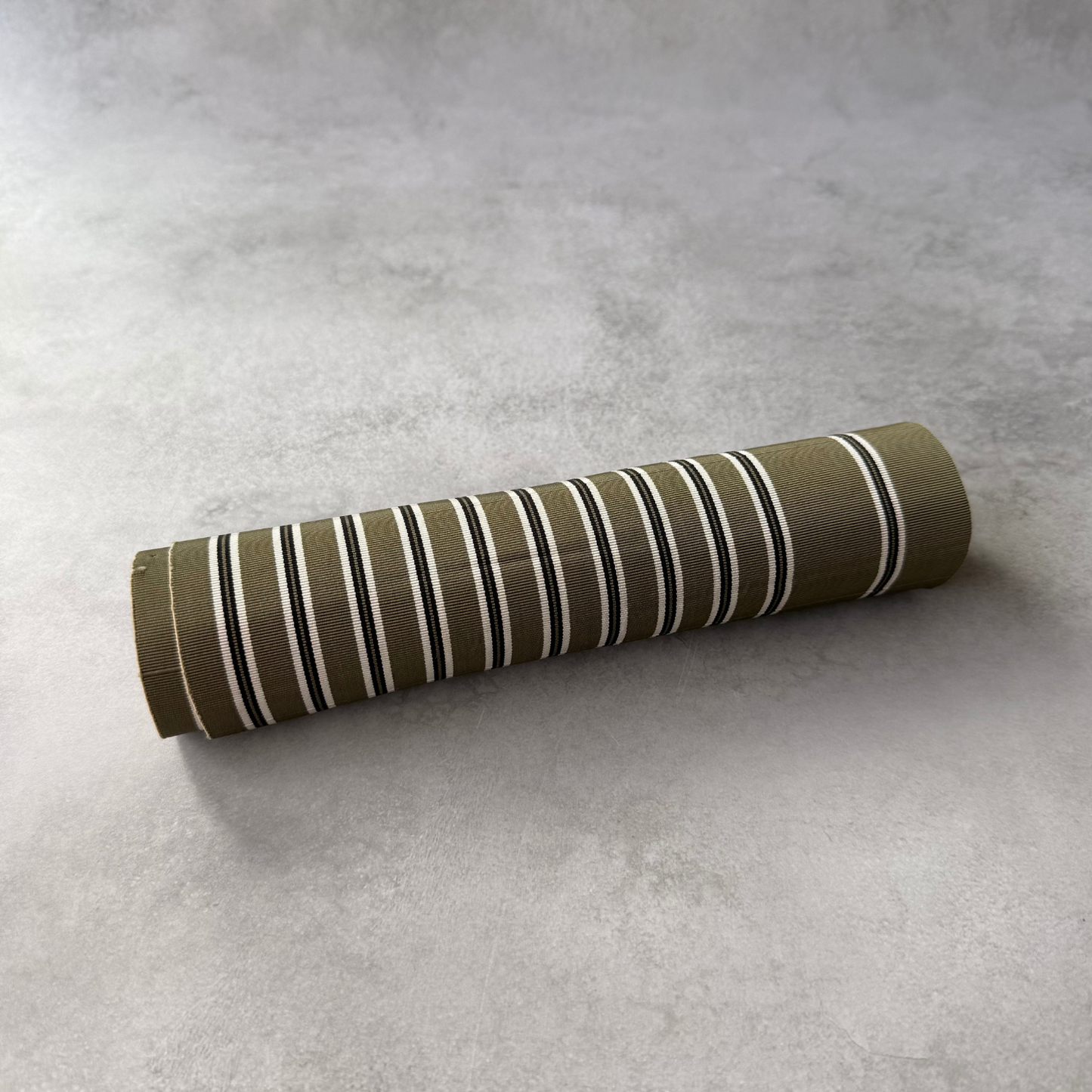 Rolled olive green striped Japanese obi fabric for sewing and crafts