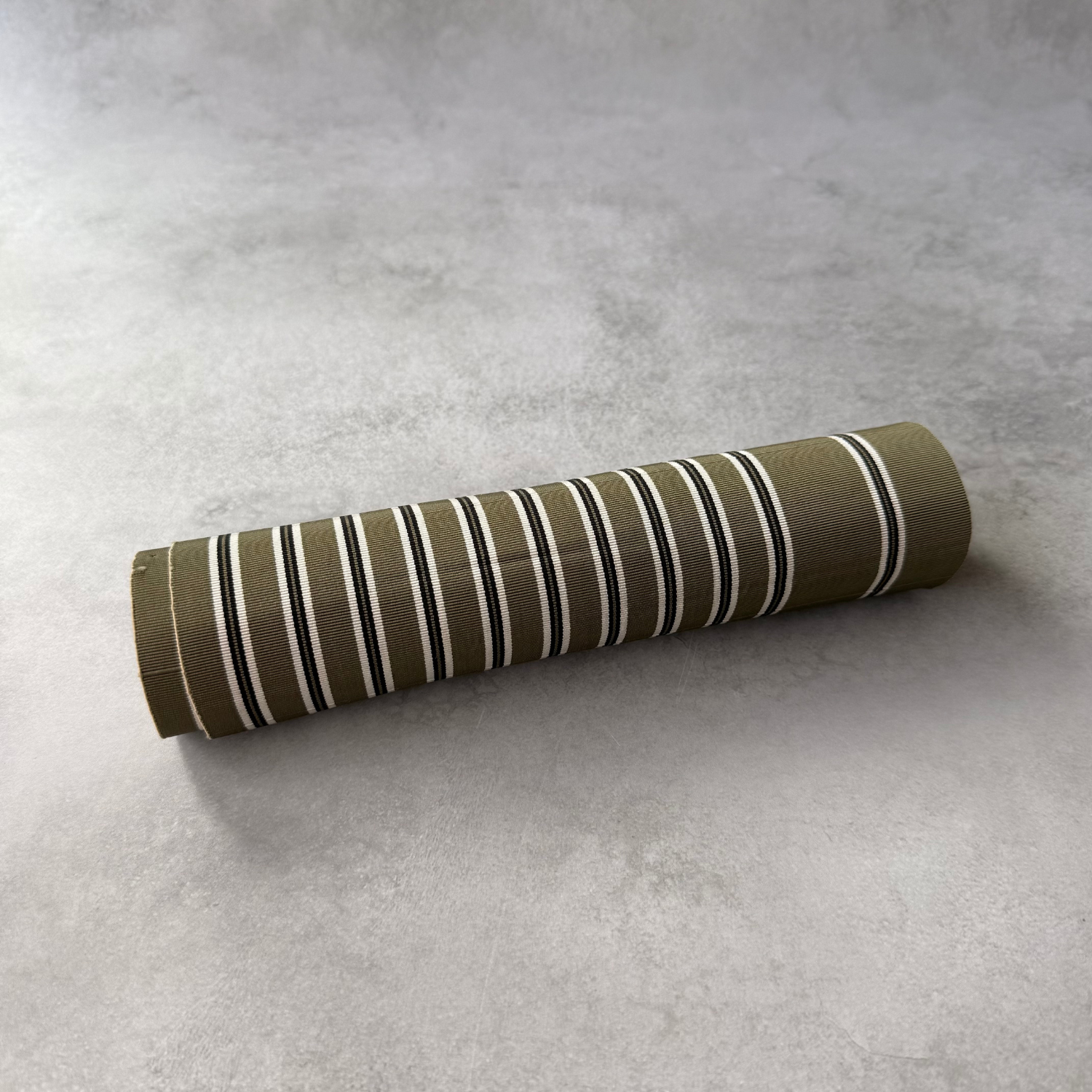 Rolled olive green striped Japanese obi fabric for sewing and crafts