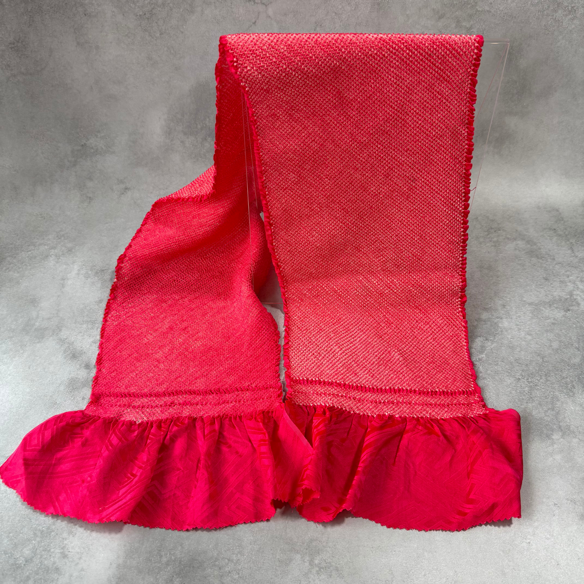 Full view of a vintage Japanese silk shibori obiage for furisode in vivid fuchsia pink