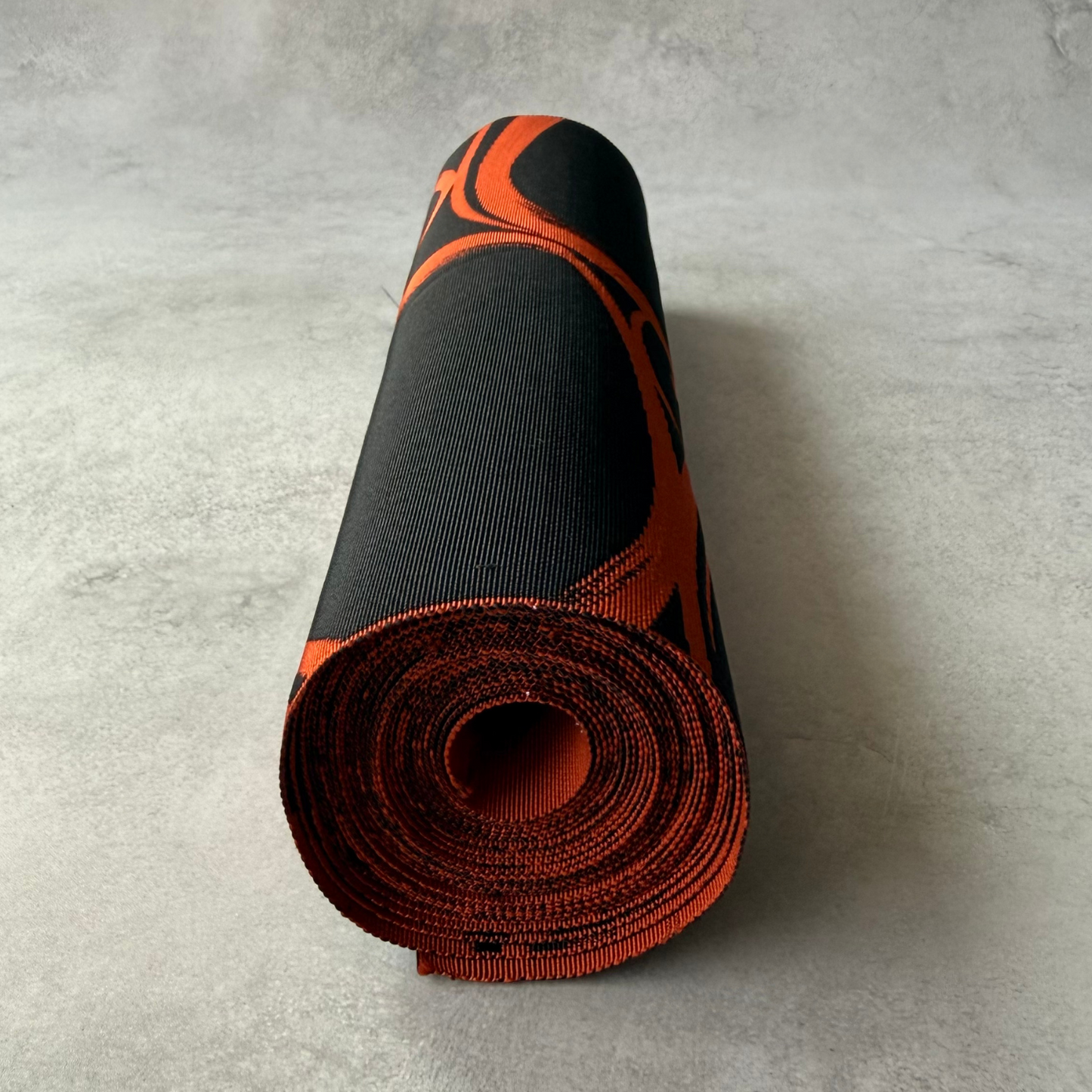 End view of antique Japanese obi fabric roll