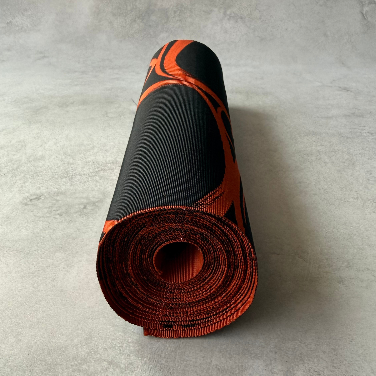 End view of antique Japanese obi fabric roll