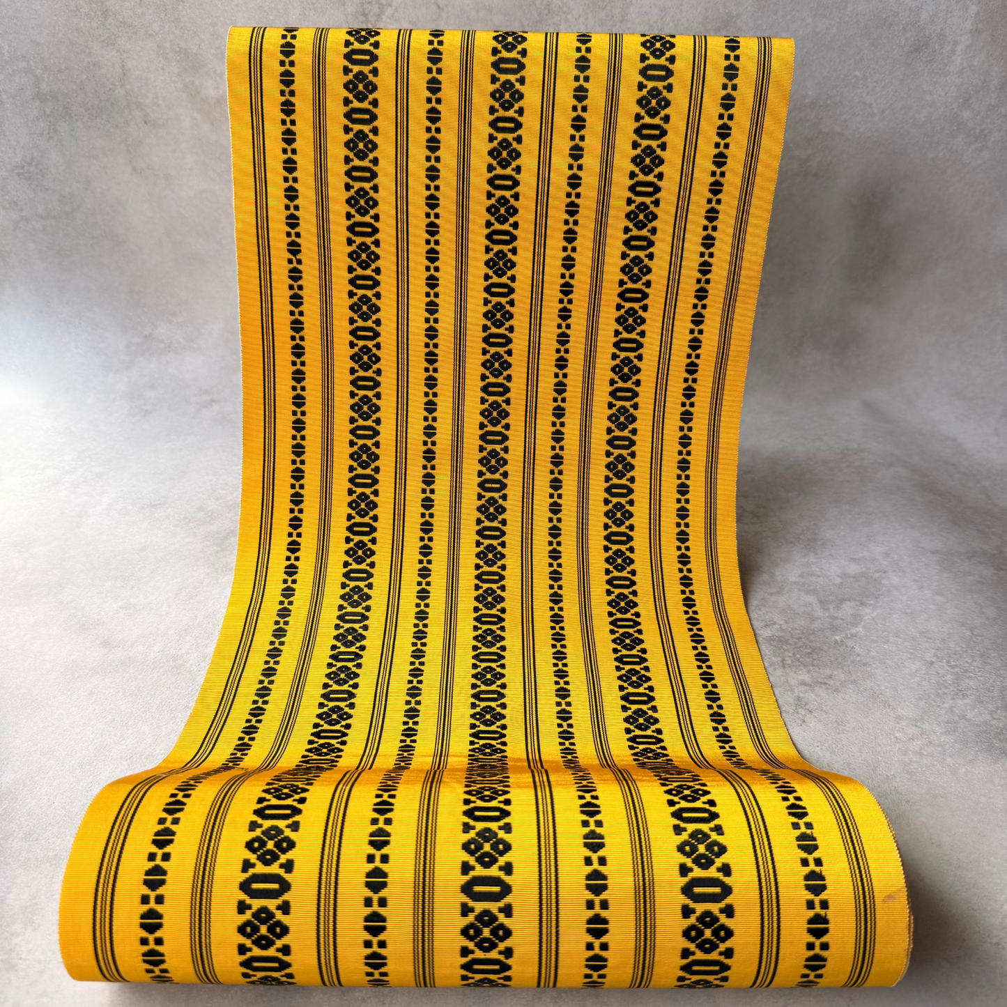 Antique Japanese yellow and black striped hachisun obi fabric bolt