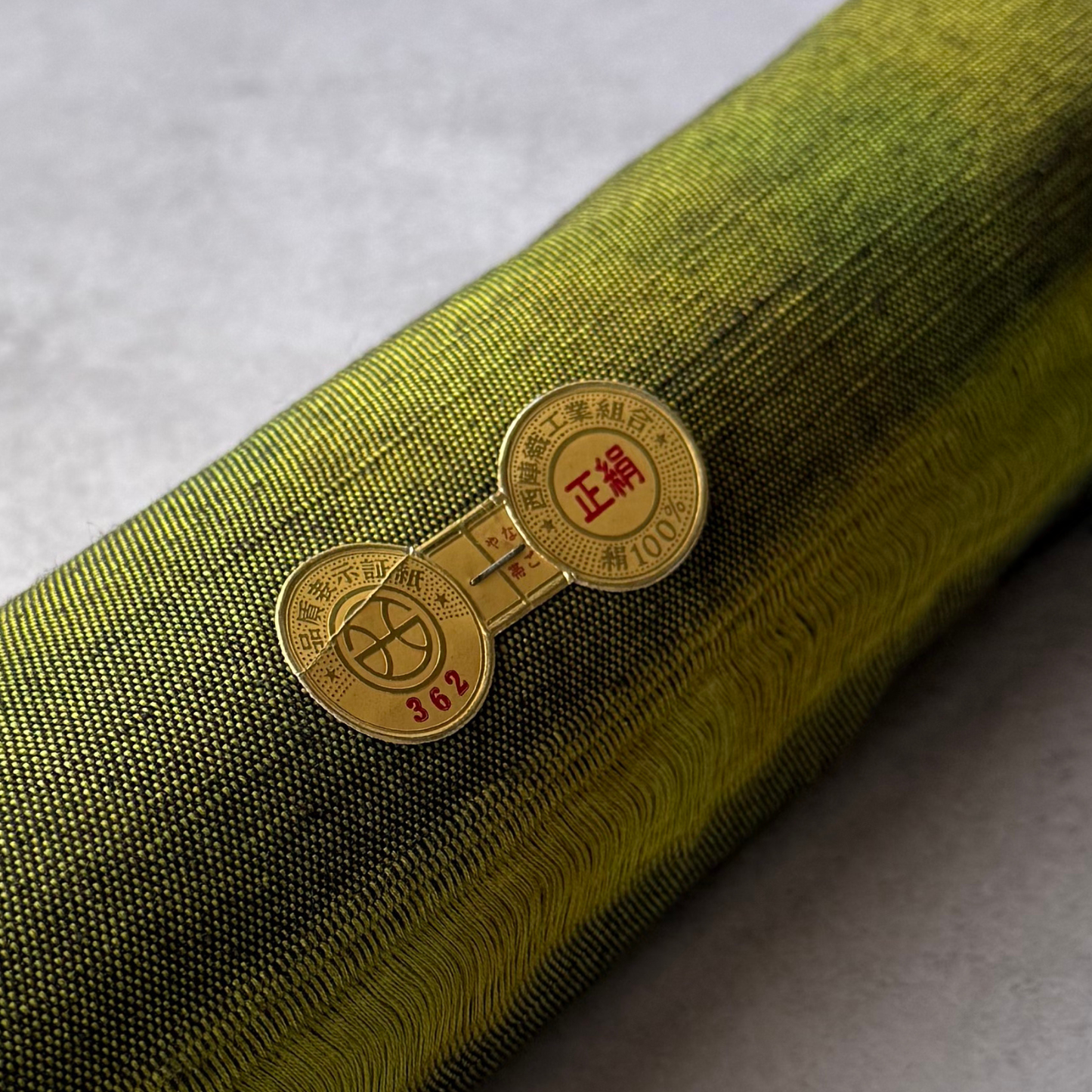 Nishijin certification label number 362 on Shirae Orimono silk obi fabric